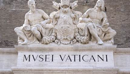 Statues above entrance to Vatican Museum