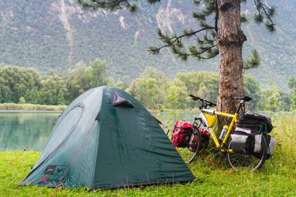 A tent and a sleeping bag are common items