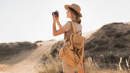 shu-gen-woman-in-khaki-dress-taking-photos-1257535729-436x246