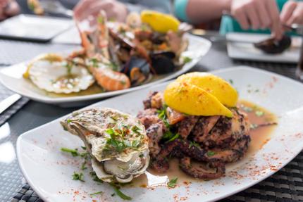 Enjoy fresh seafood in Marsaxlokk, Malta