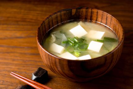 Miso soup in a small wooden bowl