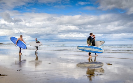 Surfers at Bamburgh